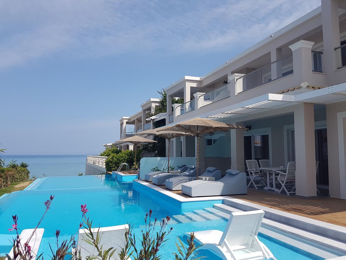 Paralia Luxury Suites Agios Stefanos Avliotes  Bagian luar foto