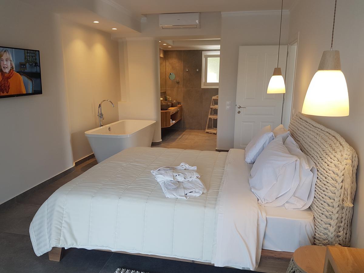 Paralia Luxury Suites Agios Stefanos Avliotes  Bagian luar foto